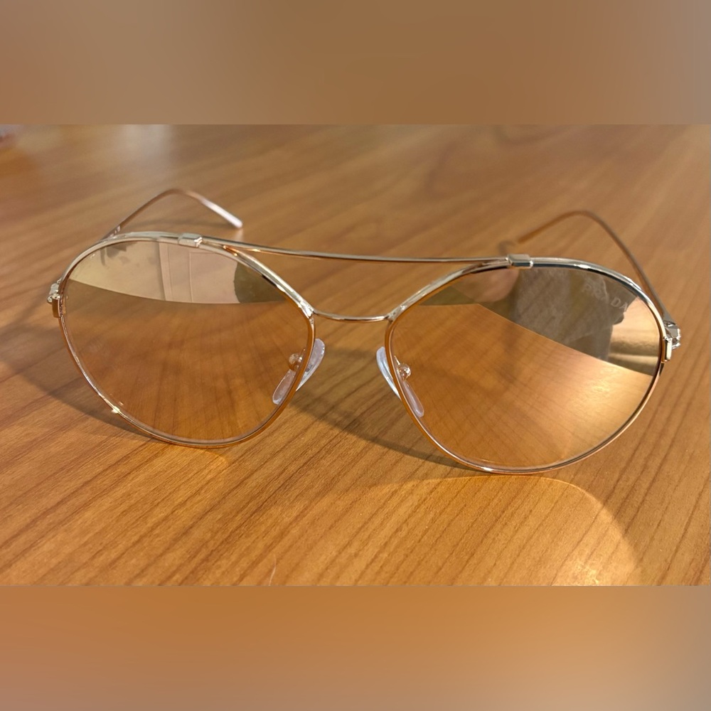 Prada Gold Frame Sunglasses with Pink-Tinted Lenses
